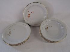 Tognana Italian porcelain dinner plates and bowls with gilt decoration
