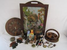 Collection of items includes - tapestry fire screen, wooden barrel lid wall clock, stone African