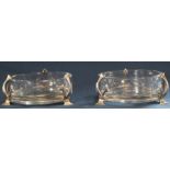 Pair of glass butter dishes in silver stands London 1902 possibly Asprey & Co