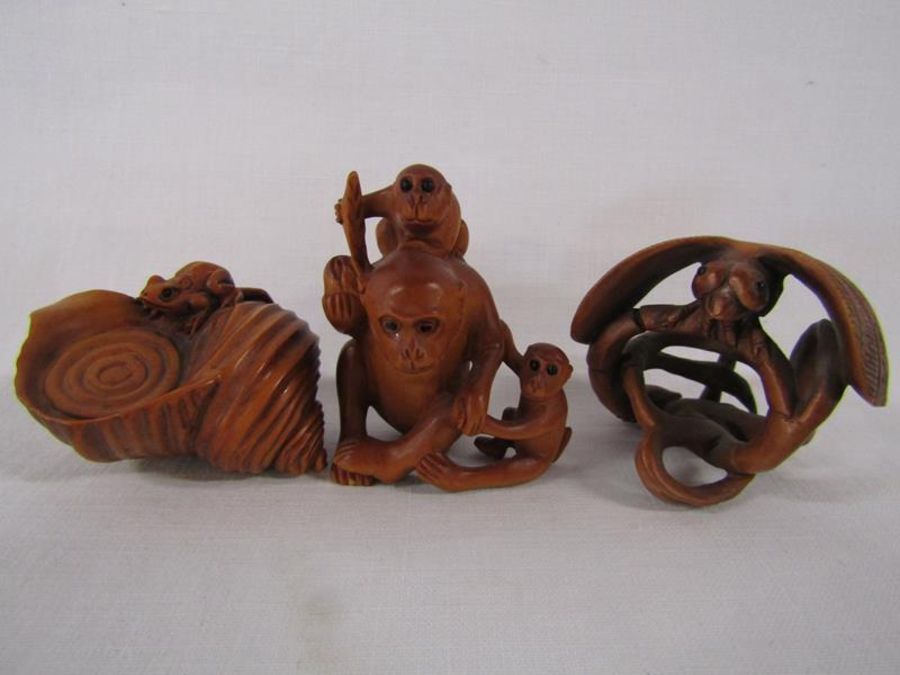 5 Wooden netsuke, signed - frog on a shell, monkey, dragonfly, bug on nuts, and a small round - Image 2 of 7