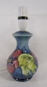 Moorcroft anemone on blue background baluster table lamp - Queen Mary label still attached - approx.