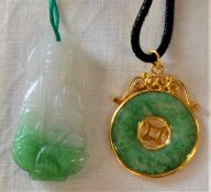Tested as 18ct gold & jade disc pendant approx. 7.13g  approx. 2.6cm dia & a Kwan Yin jade pendant