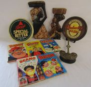 Bass & Kimberley ales trays, wooden African wall figures, brass chestnut warmer, Dandy, Beano and