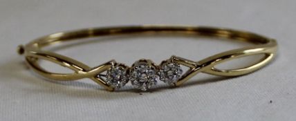 Diamond set bangle / bracelet marked 18k / 0.750, 11.79g