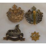 Two Lincolnshire Yeomanry cap badges, Lincolnshire Regiment Grantham School OTC cap badge,