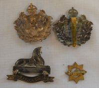 Two Lincolnshire Yeomanry cap badges, Lincolnshire Regiment Grantham School OTC cap badge,