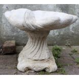 Shell bird bath, large shell on decorative base