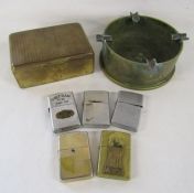 Brass shell ashtray, State Express cigarette tin and collection of Zippo lighters