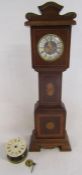 Miniature grandfather clock with marquetry and later added Mercedes West Germany clock - original