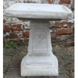 Clasico square bird bath adorned with a rose