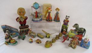 Collection of tin plate / clockwork toys includes boxed Mockba 1980 Olympic souvenir doll, bar