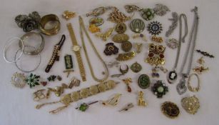 Collection of costume jewellery, includes watch, necklaces, bangles, brooches etc