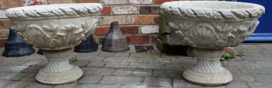 Pair of large concrete urns with acanthus leaves