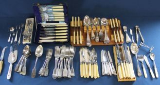 Quantity of silver plated cutlery, pickle forks, lobster picks etc. some with family crests, some