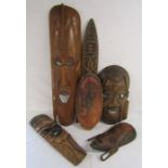 4 African tribal masks, one marked Jambo Kenya 1990 and 2 African tribal shields one labelled