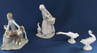 4 Lladro figurines: girl with a calf, matt figurine girl with ducklings (finger missing) & 2 geese