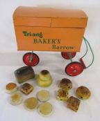Tri-ang orange Baker's Barrow with Hovis loaf, muffins, crumpets, currant buns etc - approx. 49cm