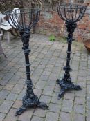 Pair of large cast iron plant stands (formerly the base of high level pub tables)