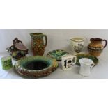 Selection of majolica including bread dish, moustache cup, invalid cup, Myott jug & one other