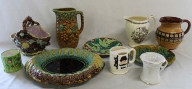 Selection of majolica including bread dish, moustache cup, invalid cup, Myott jug & one other