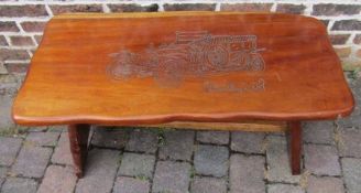 Heavy wooden coffee table with Rolls Royce carved top - 110cm x 54cm x 48cm