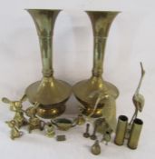Collection of brass includes 2 vases, storks, mice, miniature toby jug etc, also 2 shell casings