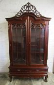 Carved mahogany glazed display cabinet on stand with removable plinth Ht 210cm W 110cm