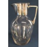 19th century clear glass claret jug with silver plated mounts 21cm high