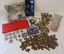 Collection of coins and coin capsules, sleeves and folders