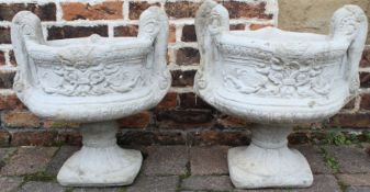 Pair of large concrete decorative two handled urns