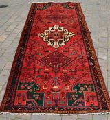 Rich red ground & emerald green full pile Persian lori carpet 310cm by 126cm