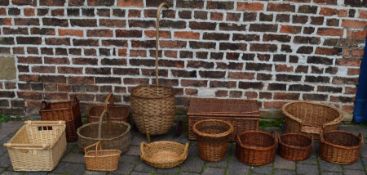 Large quantity of wicker basket ware, including shopper, dog bed, picnic hamper, etc