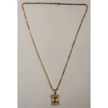 18ct gold chain and pendant with emblem of Saudi Arabia, 16.1g