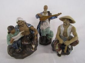 3 Shiwan figures - labourer, man with girl reading and man playing a guitar