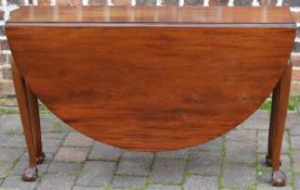 Early 20th century mahogany gate leg table with ball and claw feet, W116cm x 135cm