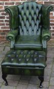 Green leather wing back chair and ottoman stool