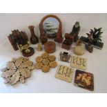 Collection of mostly wooden items includes ships wheel nutcracker, place mats, glasses holder,