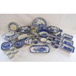 Collection of mixed blue and white tableware includes coffee cans, saucers, bowls, Ivanhoe