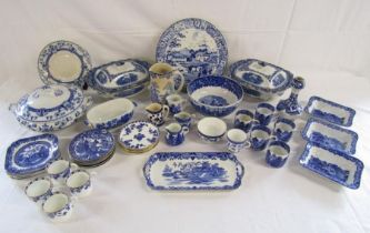 Collection of mixed blue and white tableware includes coffee cans, saucers, bowls, Ivanhoe