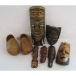 Pair of Dutch clogs and selection of African tribal masks
