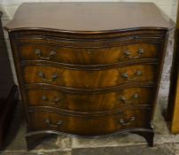 Reproduction Georgian serpentine fronted chest of drawers on bracket feet with a brushing slide &