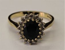 9ct Sapphire and diamond cluster ring, 2.8g, size M
