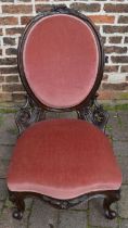 Victorian nursing chair on scroll legs