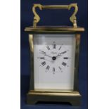 20th century brass cased Angelus carriage clock, 18cm tall with handle raised - with key (appears to