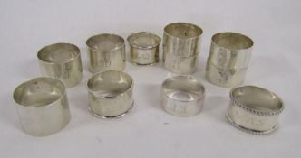 11 silver napkin rings some with engraving - total weight 9.18ozt