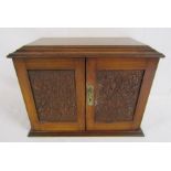 Wooden smokers cabinet with carved doors, lift up lid and inner drawers - approx. 37.5cm x 28cm x