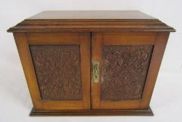 Wooden smokers cabinet with carved doors, lift up lid and inner drawers - approx. 37.5cm x 28cm x