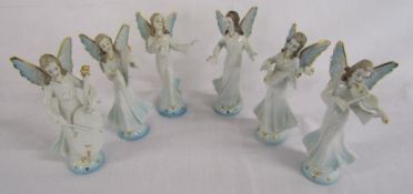 6 Dresden angel figurines, all playing musical instruments - marked to base with 3 point crown and