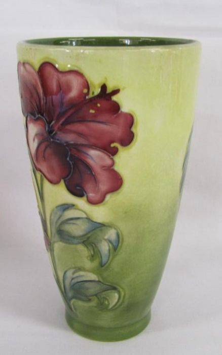 Moorcroft tapered vase with wider top bearing hibiscus design on yellow background with green - Image 2 of 3