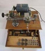 BTM watchmakers lathe B-Tab M co 1778 with Fracmo motor on an oak box with drawer containing collets